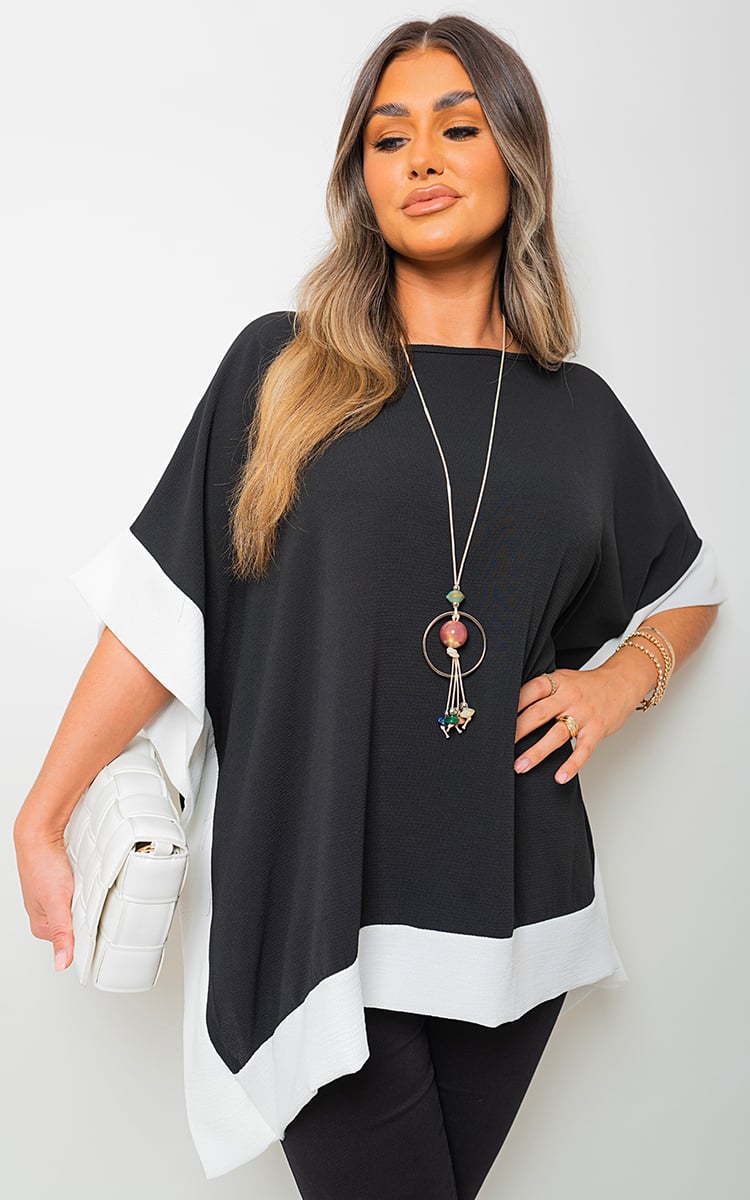 LAURA Oversized Contrast Hem Flare Sleeve Top