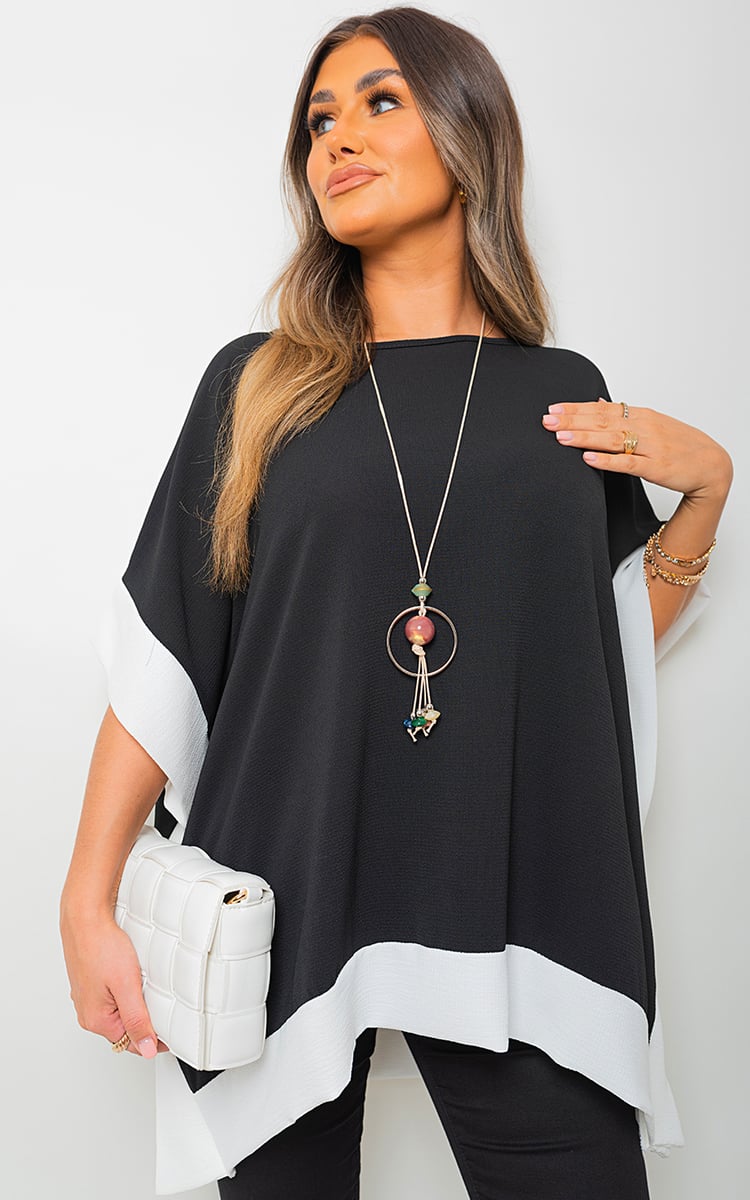 LAURA Oversized Contrast Hem Flare Sleeve Top