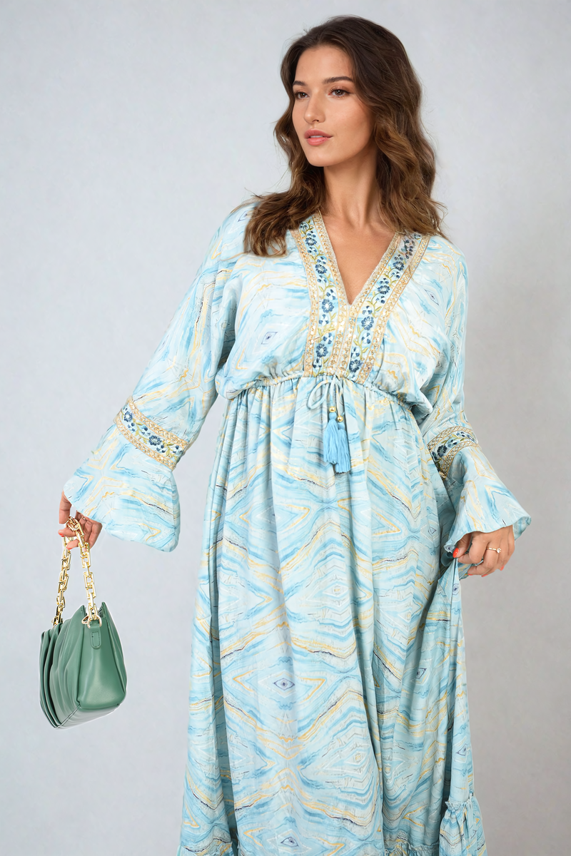 MELODY Printed Long V-Neck Ruffled Hem Maxi Dress with Front Tassel Detail